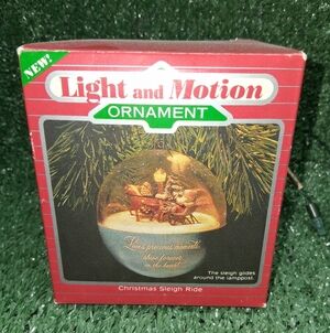 1986 Hallmark Holiday Magic Light & Motion Ornament Christmas Sleigh Ride in box